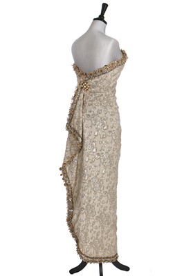 Lot 121 - A fine Balenciaga couture gold cloqué sheath, 1965