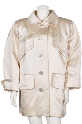 Lot 179 - An Yves Saint Laurent couture ivory satin evening jacket, probably Spring-Summer 1988