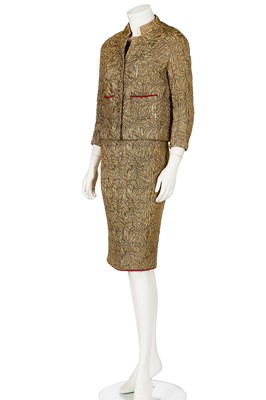 Lot 20 - A Chanel couture gold brocatelle cocktail ensemble gold suit, 1962