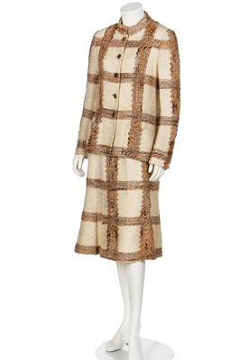 Lot 15 - A Chanel couture oatmeal and ivory tweed suit, 1969