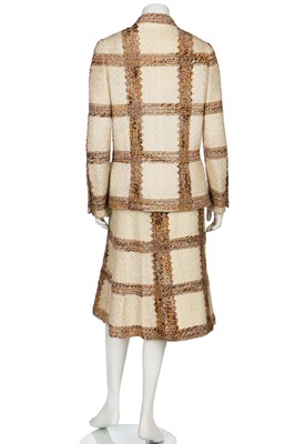 Lot 15 - A Chanel couture oatmeal and ivory tweed suit, 1969