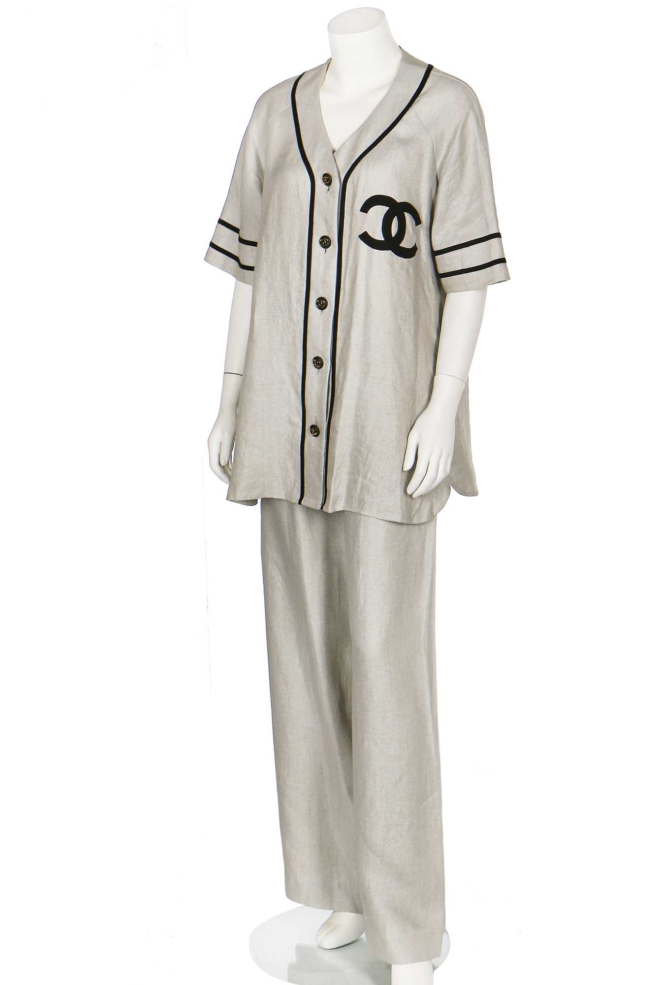 Lot 18 - A Chanel by Karl Lagerfeld linen baseball-style ensemble, probably 1984