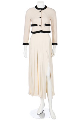 Lot 234 - A Chanel ivory bouclé wool cropped jacket, 1990s