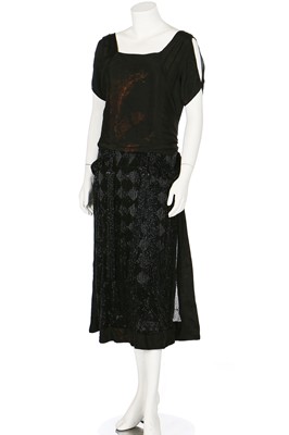 Lot 74 - A fine and early Gabrielle Chanel couture 'Little Black Dress', circa 1921