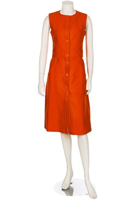 Lot 128 - A Courrèges orange satinised cotton two-piece ensemble, late 1960s-early 1970s