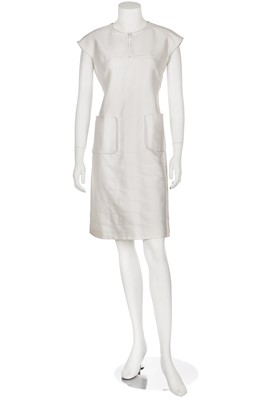 Lot 129 - A Courrèges white satinised cotton dress, circa 1970