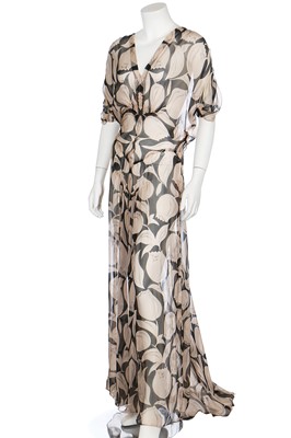Lot 56 - Three floral printed chiffon garden-party dresses, 1930s