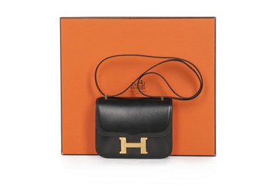 Lot 4 - An Hermès black box leather mini Constance bag,...