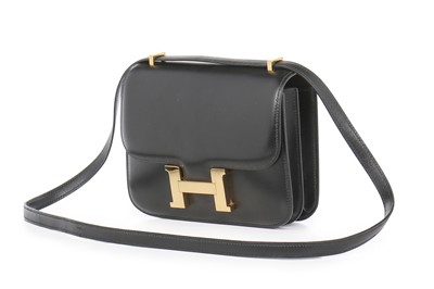 Lot 4 - An Hermès black box leather mini Constance bag,...