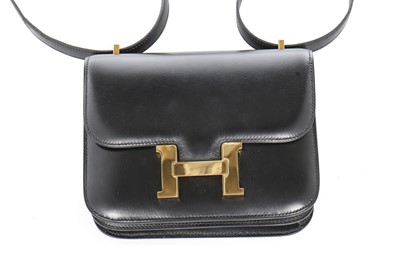 Lot 4 - An Hermès black box leather mini Constance bag,...