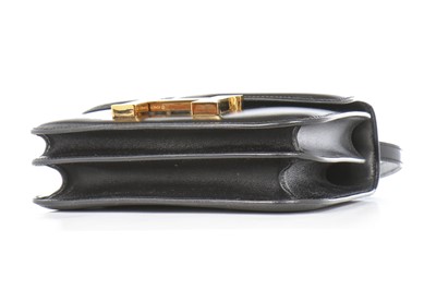Lot 4 - An Hermès black box leather mini Constance bag,...