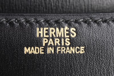 Lot 4 - An Hermès black box leather mini Constance bag,...