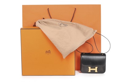 Lot 4 - An Hermès black box leather mini Constance bag,...