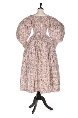 Lot 88 - A printed cotton day dress and matching fichu,...