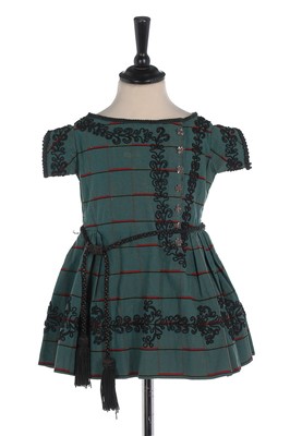 Lot 90 - An infant's checked wool dress, 1860s, with...
