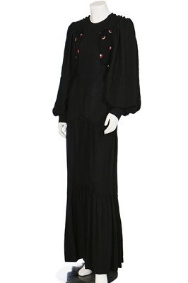 Lot 144 - An Ossie Clark moon and stars embroidered black moss crêpe dress, circa 1970