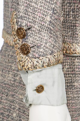 Lot 17 - A Chanel couture grey-pink tweed suit, 1960