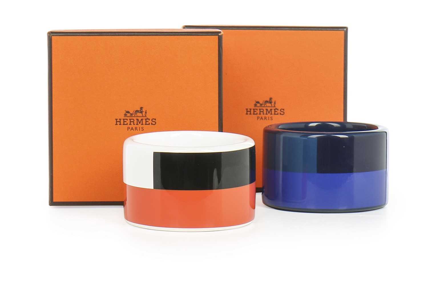 Lot 5 - Two Hermès lacquered 'Assam Bois' bangles,...
