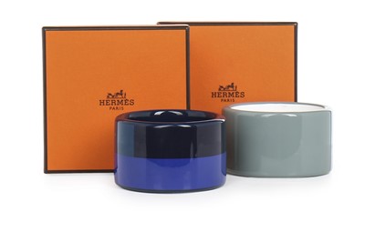 Lot 9 - Two Hermès lacquered 'Assam Bois' bangles,...