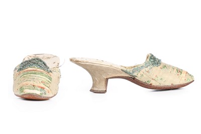 Lot 79 - A pair of brocaded silk mules, French, circa...
