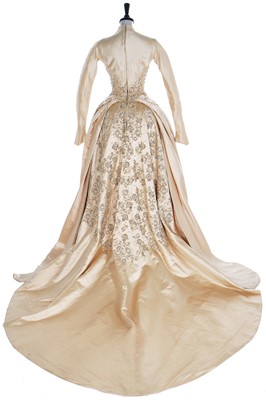 Lot 97 - A good Norman Hartnell couture satin bridal gown, circa 1953