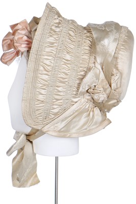 Lot 39 - An  ivory silk bonnet and bridal headdress, circa 1845