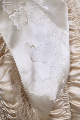 Lot 39 - An  ivory silk bonnet and bridal headdress, circa 1845