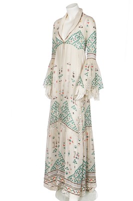 Lot 159 - A Karl Lagerfeld for Chloé silk dress printed with pixilated dancers, 1970s