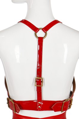 Lot 295 - A Lady Gaga-worn 'Red Bleeding' look, comprising red latex skirt by Karina Akopyan and Carapace patent leather bullet bra, 2017