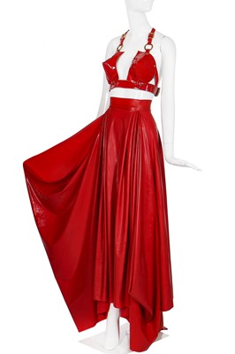 Lot 295 - A Lady Gaga-worn 'Red Bleeding' look, comprising red latex skirt by Karina Akopyan and Carapace patent leather bullet bra, 2017