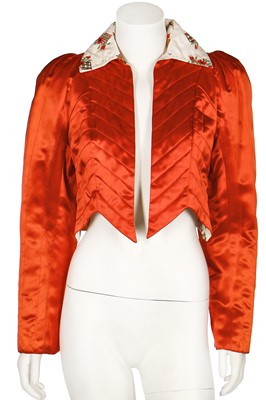 Lot 163 - An Ossie Clark/Celia Birtwell quilted red satin cropped jacket, circa 1972
