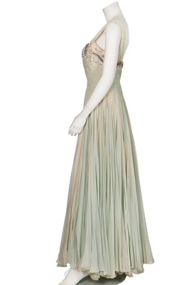 Lot 93 - A Carven couture draped chiffon evening gown, early 1950s