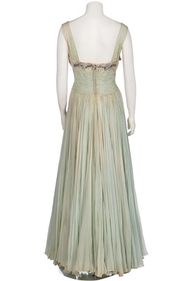 Lot 93 - A Carven couture draped chiffon evening gown, early 1950s