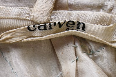 Lot 93 - A Carven couture draped chiffon evening gown, early 1950s