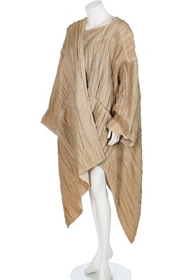 Lot 270 - An Issey Miyake rippled bark-effect asymmetric coat, Spring-Summer 1984