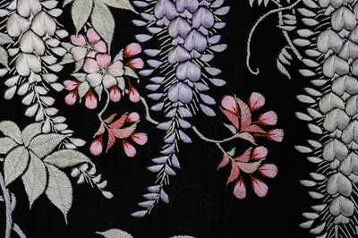 Lot 64 - A silk kimono finely embroidered with wisteria, Japanese for the European market, 1910-20