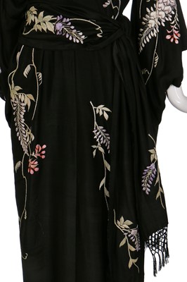 Lot 64 - A silk kimono finely embroidered with wisteria, Japanese for the European market, 1910-20