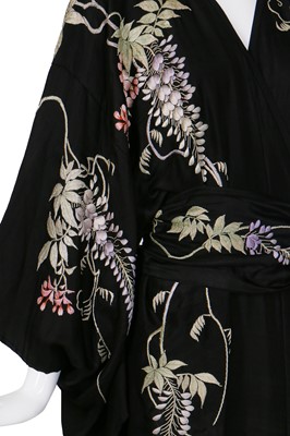 Lot 64 - A silk kimono finely embroidered with wisteria, Japanese for the European market, 1910-20