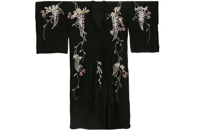 Lot 64 - A silk kimono finely embroidered with wisteria, Japanese for the European market, 1910-20
