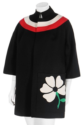Lot 112 - A Louis Feraud black wool coat for an adolescent girl, mid 1960s