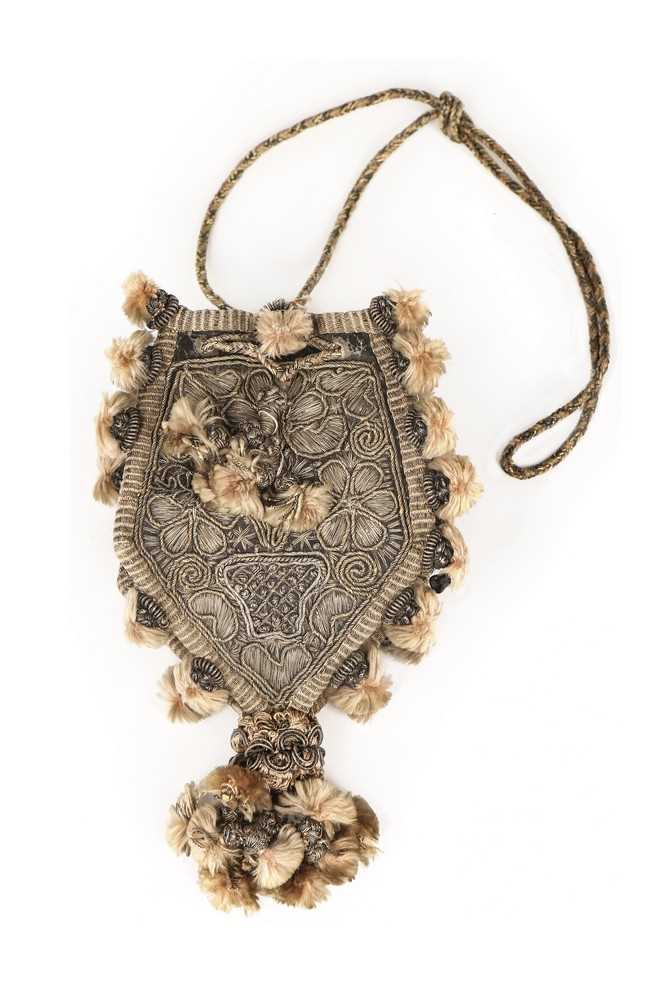 Lot 69 - A metal thread embroidered purse, early 17th...