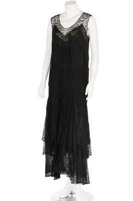 Lot 57 - A black chiffon evening dress with lace insertions, circa 1930