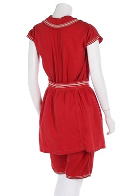 Lot 97 - A red wool-cotton bathing costume, circa 1910,...