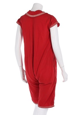 Lot 97 - A red wool-cotton bathing costume, circa 1910,...