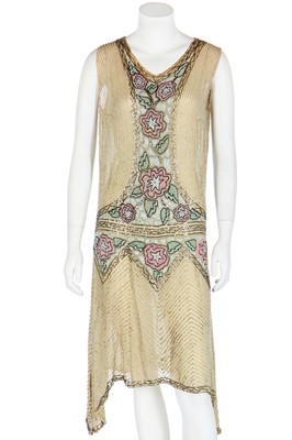Lot 48 - A beaded pale yellow muslin flapper dress, circa 1925