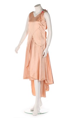 Lot 111 - A Nicole Groult peach satin dress, mid 1920s,...