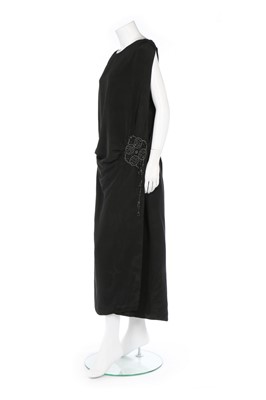 Lot 112 - A Lucien Lelong couture black silk faille...