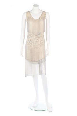 Lot 114 - A couture ivory chiffon beaded flapper dress,...
