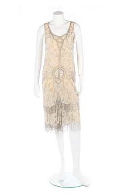 Lot 116 - An ivory chiffon beaded flapper dress,...