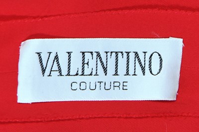Lot 149 - A Valentino Garavani couture red crêpe ensemble, probably 1970s
